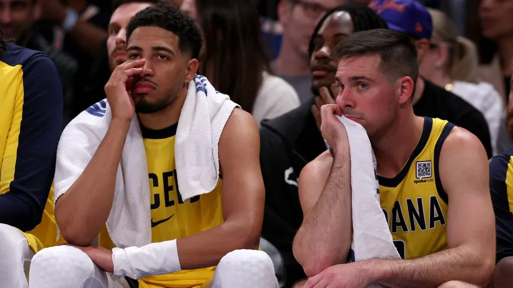 Tyrese Haliburton #0 and T.J. McConnell #9 of the Indiana Pacers react on the bench in the fourth quarter against the New York Knicks at Madison Square Garden. Elsa/Getty Images