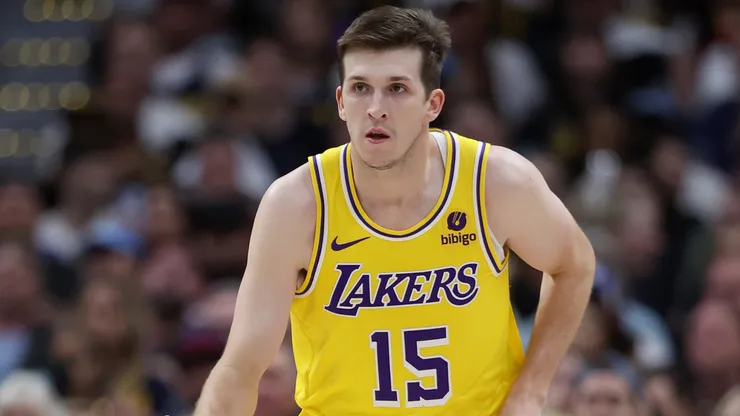 Austin Reaves #15 of the Los Angeles Lakers brings the ball down court against the Denver Nuggets in the third quarter during game five of the Western Conference First Round Playoffs at Ball Arena on April 29, 2024 in Denver, Colorado.