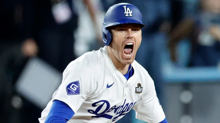 Freddie Freeman #5 of the Los Angeles Dodgers celebrates after hitting a walk-off grand slam during the tenth inning against the New York Yankees during Game One of the 2024 World Series at Dodger Stadium on October 25, 2024 in Los Angeles, California.