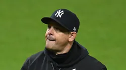 Manager Aaron Boone #17 of the New York Yankees walks to the dugout during the seventh inning against the Cleveland Guardians during Game Three of the American League Championship Series at Progressive Field on October 17, 2024 in Cleveland, Ohio.