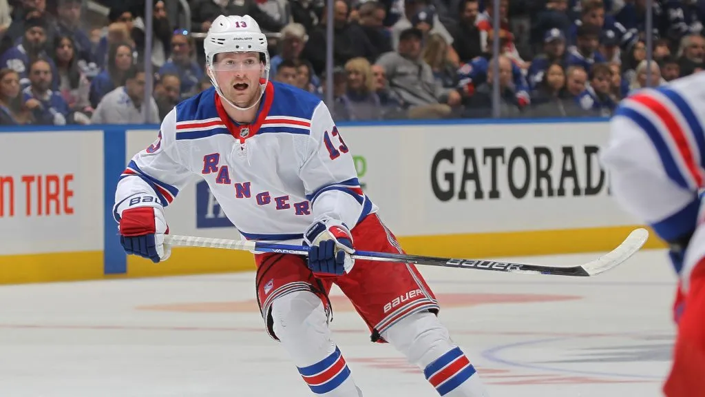Alexis Lafreniere #13 of the New York Rangers skates against the Toronto Maple Leafs during the 3rd period in an NHL game at Scotiabank Arena on October 19, 2024 in Toronto, Ontario, Canada. The Rangers defeated the Maple Leafs 4-1. (Photo by Claus Andersen/Getty Images)