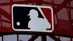 A MLB logo is seen before a game between the Oakland Athletics and the Los Angeles Angels at Angel Stadium of Anaheim on May 22, 2022 in Anaheim, California.