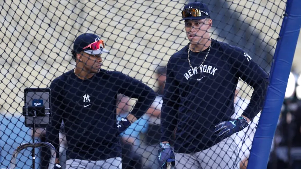 Juan Soto #22 and Aaron Judge #99 of the New York Yankees look on during batting practice on workout day ahead of Game 1 of the 2024 World Series at Dodger Stadium on October 24, 2024 in Los Angeles, California. (Photo by Kevork Djansezian/Getty Images)