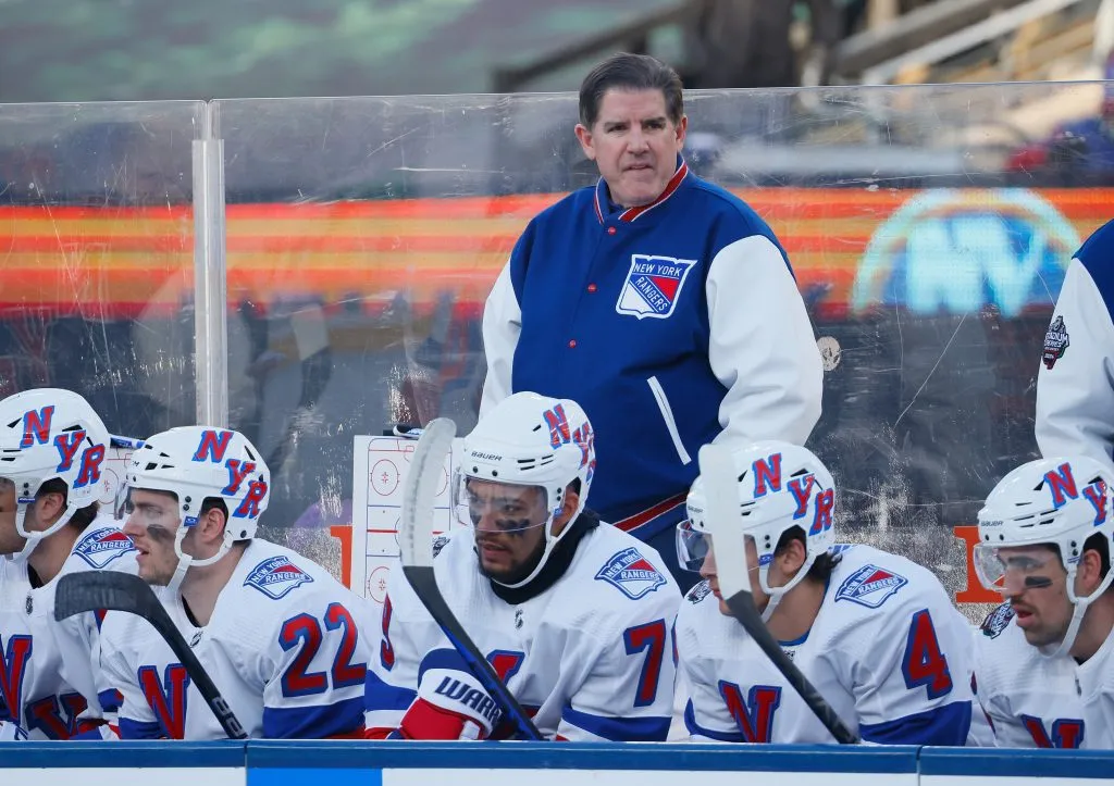 Head coach Peter Laviolette of the New York Rangers handles the bench against the New York Islanders  during the 2024 Navy Federal Credit Union Stadium Series game at MetLife Stadium on February 18, 2024 in East Rutherford, New Jersey. 