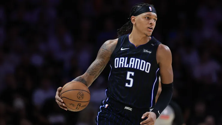 Paolo Banchero #5 of the Orlando Magic controls the ball against the Miami Heat during the second half at Kaseya Center on October 23, 2024 in Miami, Florida.
