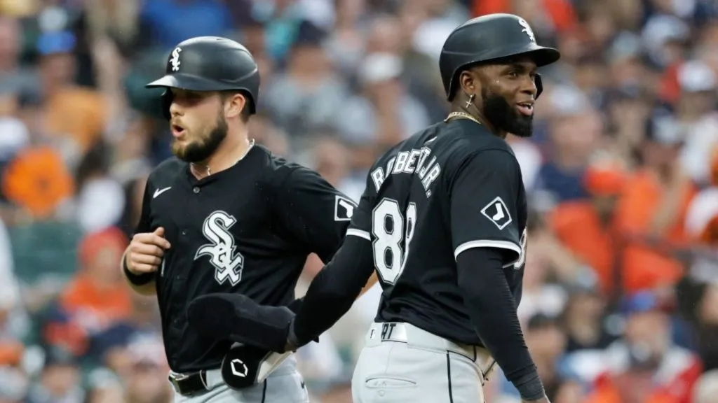 Zach DeLoach #31 and Luis Robert Jr. #88 of the Chicago White Sox