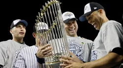 (L-R) Andy Pettitte #46, Jorge Posada #20, Derek Jeter #2 and Mariano Rivera #42 of the New York Yankees celebrate with the trophy after their 7-3 win against the Philadelphia Phillies in Game Six of the 2009 MLB World Series at Yankee Stadium on November 4, 2009 in the Bronx borough of New York City.