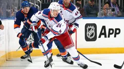 Kaapo Kakko #24 of the New York Rangers skates against the New York Islanders during the first period at UBS Arena on October 04, 2024 in Elmont, New York.