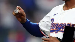 Jose Leclerc #25 of the Texas Rangers shows his World Series ring prior to a game against the Chicago Cubs at Globe Life Field on March 30, 2024 in Arlington, Texas.
