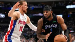Jaden Hardy #1 of the Dallas Mavericks is defended by Malachi Flynn #14 of the Detroit Pistons during the first half at American Airlines Center on April 12, 2024 in Dallas, Texas.