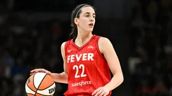 Caitlin Clark #22 of the Indiana Fever dribbles the ball in the first quarter of the game against the Minnesota Lynx