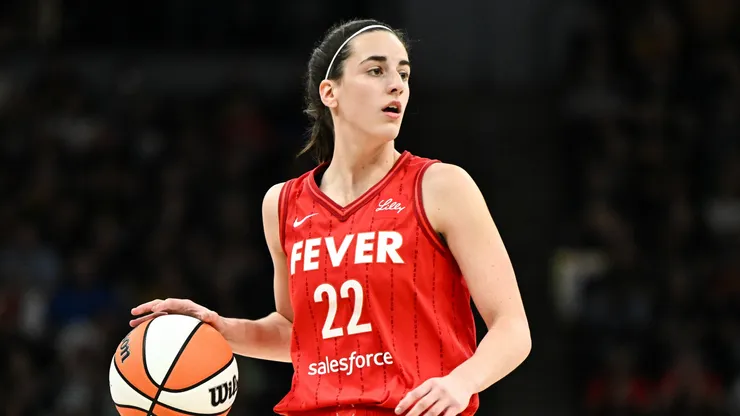 Caitlin Clark #22 of the Indiana Fever dribbles the ball in the first quarter of the game against the Minnesota Lynx