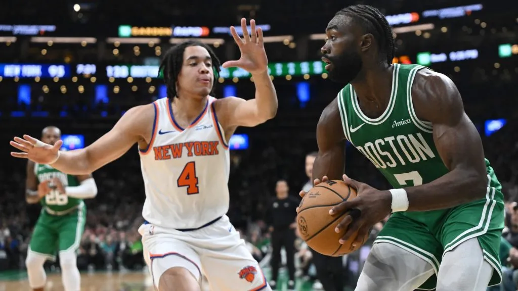 Jaylen Brown #7 of the Boston Celtics makes a move on Pacome Dadiet #4 of the New York Knicks during the fourth quarter at TD Garden on October 22, 2024 in Boston, Massachusetts. (Photo by Brian Fluharty/Getty Images)