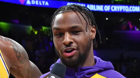 LeBron James #23 and Bronny James #9 of the Los Angeles Lakers are interviewed after the game against the Minnesota Timberwolves at Crypto.com Arena on October 22, 2024 in Los Angeles, California.