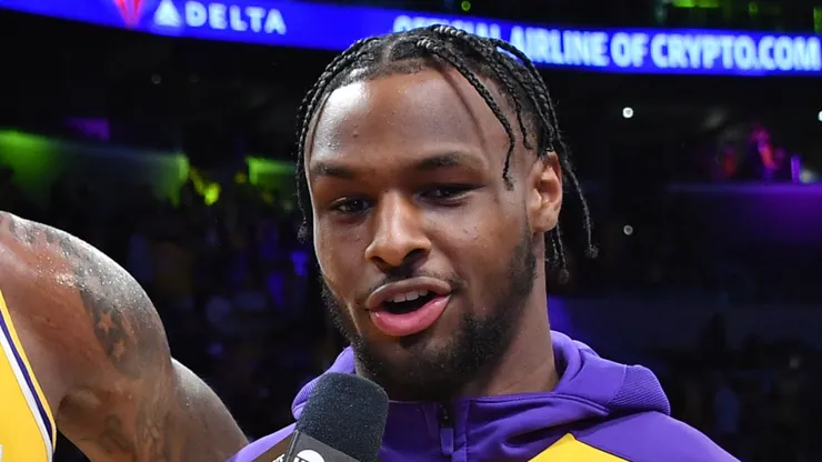 LeBron James #23 and Bronny James #9 of the Los Angeles Lakers are interviewed after the game against the Minnesota Timberwolves at Crypto.com Arena on October 22, 2024 in Los Angeles, California.