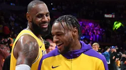 LeBron James #23 and Bronny James #9 of the Los Angeles Lakers are interviewed after the game against the Minnesota Timberwolves at Crypto.com Arena on October 22, 2024, in Los Angeles, California.