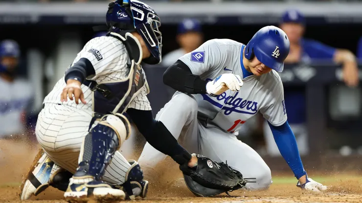 Shohei Ohtani #17 of the Los Angeles Dodgers slides safely into home plate against the New York Yankees at Yankee Stadium on June 09, 2024 in the Bronx borough of New York City. (Photo by Luke Hales/Getty Images)
