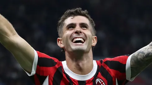 Christian Pulisic of AC Milan celebrates scoring his team's third goal during the Serie A match between AC Milan and US Lecce at Stadio Giuseppe Meazza on September 27, 2024 in Milan, Italy.