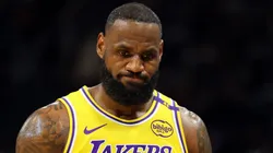 LeBron James #23 of the Los Angeles Lakers walks backcourt during a preseason game against the Milwaukee Bucks at Fiserv Forum on October 10, 2024 in Milwaukee, Wisconsin.