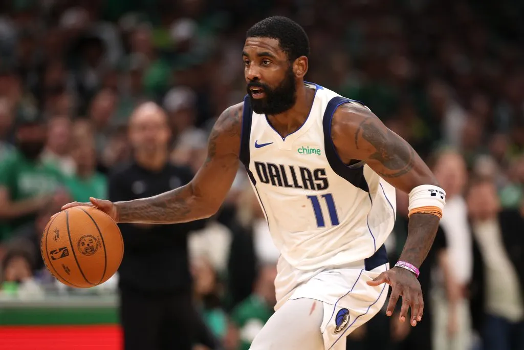 Kyrie Irving #11 of the Dallas Mavericks dribbles during the fourth quarter of Game Five of the 2024 NBA Finals against the Boston Celtics. Elsa/Getty Images