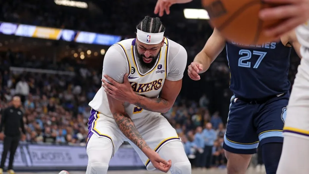Anthony Davis #3 of the Los Angeles Lakers is injured during the first half against the Memphis Grizzlies during Game One of the Western Conference First Round Playoffs at FedExForum on April 16, 2023 in Memphis, Tennessee.