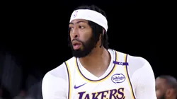 Anthony Davis #3 of the Los Angeles Lakers reacts after a three-point basket during the first quarter against the Phoenix Suns at Acrisure Arena on October 06, 2024 in Palm Springs, California.