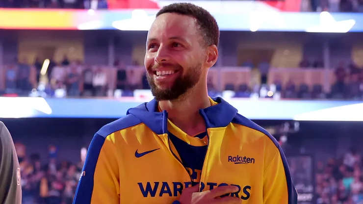 Stephen Curry #30 of the Golden State Warriors stands for the national anthem before their preseason game against the Sacramento Kings