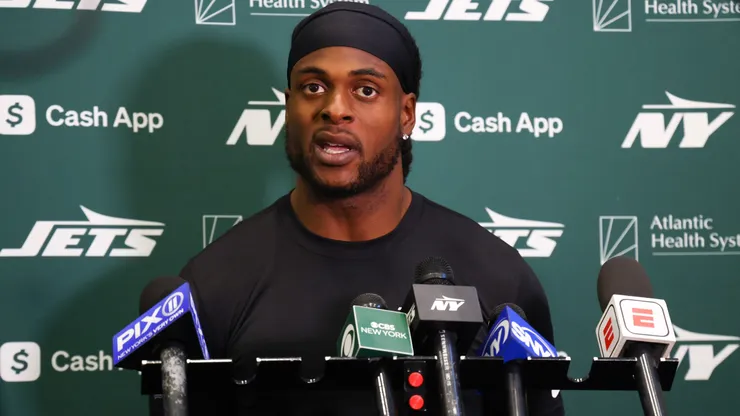 Davante Adams #17 of the New York Jets speaks to members of the media at the Atlantic Health Jets Training Center on October 16, 2024 in Florham Park, New Jersey.