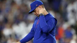 Manager Carlos Mendoza #64 of the New York Mets reacts as he walks back to the dugout after pulling pitcher Ryne Stanek #55 during the 6th inning of Game Six of the National League Championship Series against the Los Angeles Dodgers at Dodger Stadium on October 20, 2024 in Los Angeles, California.