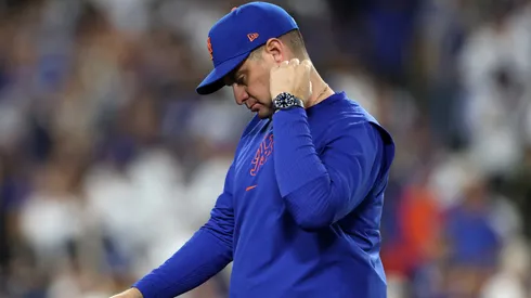 Manager Carlos Mendoza #64 of the New York Mets reacts as he walks back to the dugout after pulling pitcher Ryne Stanek #55 during the 6th inning of Game Six of the National League Championship Series against the Los Angeles Dodgers at Dodger Stadium on October 20, 2024 in Los Angeles, California.