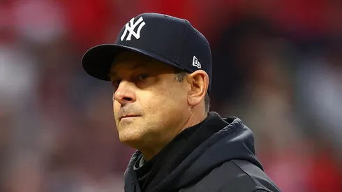 Manager Aaron Boone #17 of the New York Yankees walks to the pitching mound during the fifth inning against the Cleveland Guardians during Game Three of the American League Championship Series at Progressive Field on October 17, 2024 in Cleveland, Ohio.