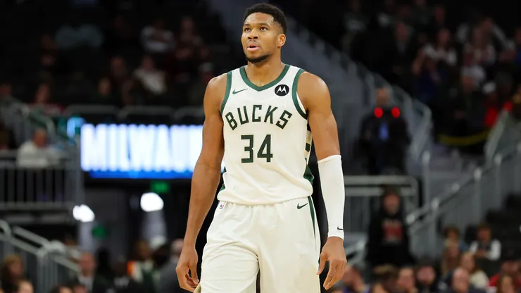 Giannis Antetokounmpo #34 of the Milwaukee Bucks walks backcourt during a preseason game against the Chicago Bulls
