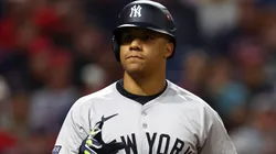 Juan Soto #22 of the New York Yankees reacts after being walked in the sixth inning against the Cleveland Guardians during Game Four of the American League Championship Series at Progressive Field on October 18, 2024 in Cleveland, Ohio.