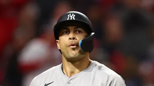 Giancarlo Stanton #27 of the New York Yankees reacts after a strikeout in the fourth inning against the Cleveland Guardians during Game Four of the American League Championship Series at Progressive Field on October 18, 2024 in Cleveland, Ohio.