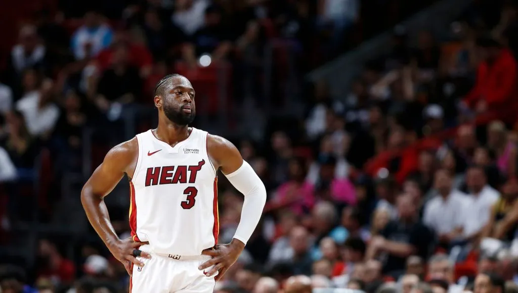 Dwyane Wade #3 of the Miami Heat looks on against the Philadelphia 76ers during the first half at American Airlines Arena on April 09, 2019 in Miami, Florida.