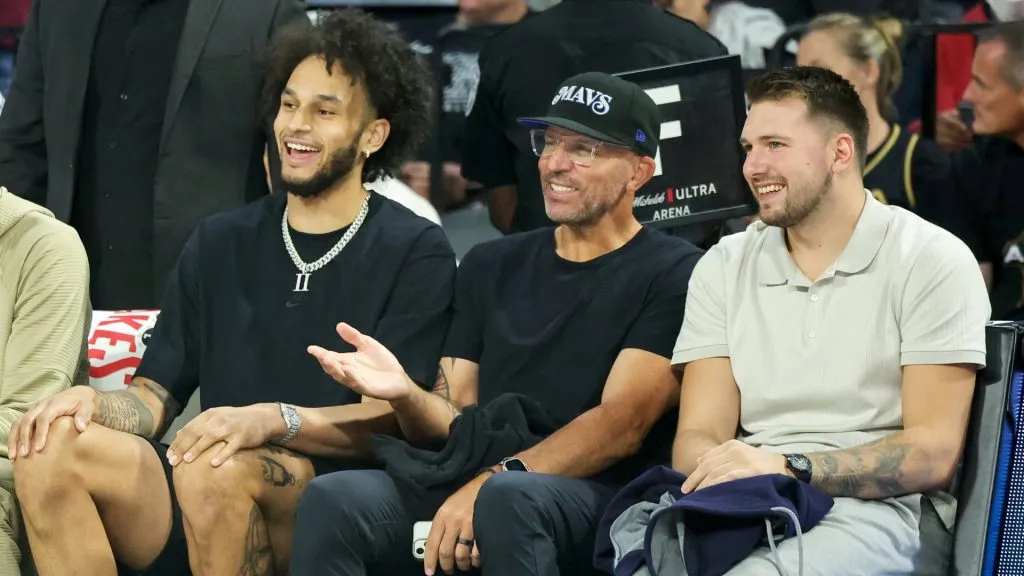 (L-R) Dereck Lively II, head coach Jason Kidd and Luka Doncic of the Dallas Mavericks attend Game Three of the 2024 WNBA Playoffs semifinals between the New York Liberty and the Las Vegas Aces at Michelob ULTRA Arena on October 04, 2024 in Las Vegas, Nevada. The Aces defeated the Liberty 95-81. 