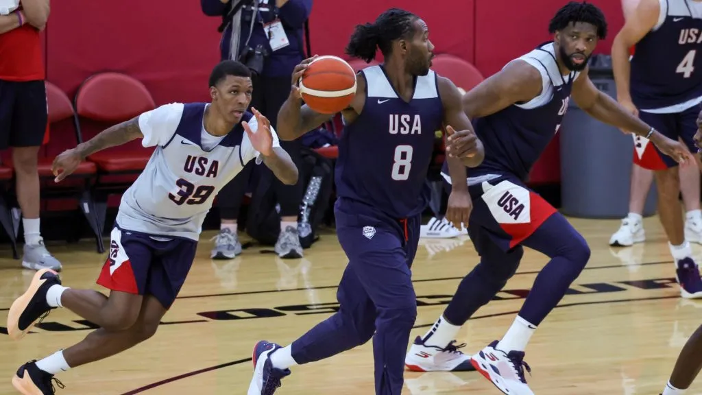 Kawhi Leonard #8 of the 2024 USA Basketball Men's National Team looks to pass under pressure from Jabari Smith Jr. #39 of the 2024 USA Basketball Men's Select Team during a practice session scrimmage at the team's training camp at the Mendenhall Center at UNLV on July 07, 2024 in Las Vegas, Nevada.