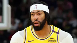 Anthony Davis #3 of the Los Angeles Lakers handles the ball during a preseason game against the Milwaukee Bucks at Fiserv Forum on October 10, 2024 in Milwaukee, Wisconsin.