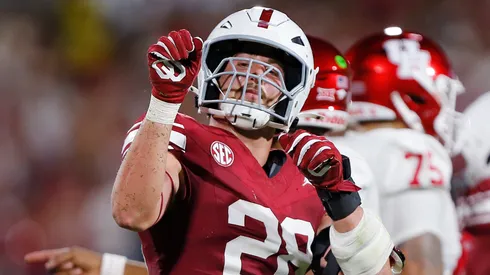 Linebacker Danny Stutsman #28 of the Oklahoma Sooners does a little dance after stopping running back Stacy Sneed #21 of the Houston Cougars with a one-yard gain on third-and-23 in the third quarter at Gaylord Family Oklahoma Memorial Stadium on September 7, 2024 in Norman, Oklahoma. Oklahoma won 16-12.