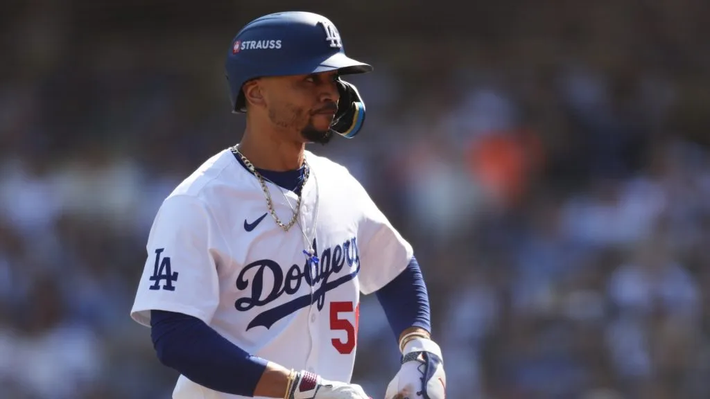 Mookie Betts #50 of the Los Angeles Dodgers reacts after striking out against the New York Mets in the first inning during Game Two of the Championship Series at Dodger Stadium on October 14, 2024 in Los Angeles, California. (Photo by Harry How/Getty Images)