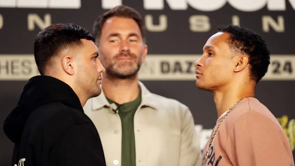 Jack Catterall (L) and Regis Prograis (R) face off in front of Promoter Eddie Hearn (C) during the Jack Catterall v Regis Prograis Press Conference at Co-op Live on July 03, 2024 in Manchester, England. (Photo by Charlotte Tattersall/Getty Images)