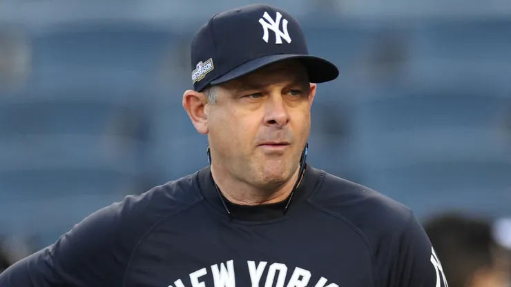 Manager Aaron Boone #17 of the New York Yankees looks on during batting practice prior to Game Two of the Division Series against the Kansas City Royals at Yankee Stadium on October 07, 2024 in New York City.