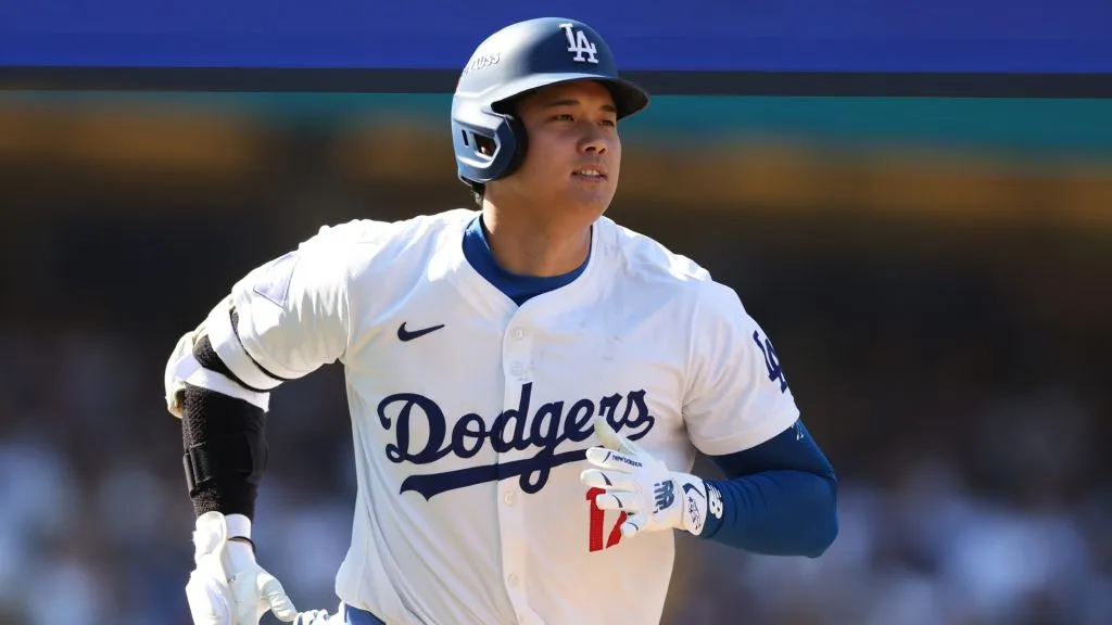 Shohei Ohtani #17 of the Los Angeles Dodgers runs after hitting a fly ball against the New York Mets in the sixth inning during Game Two of the Championship Series at Dodger Stadium on October 14, 2024 in Los Angeles, California. (Photo by Sean M. Haffey/Getty Images)