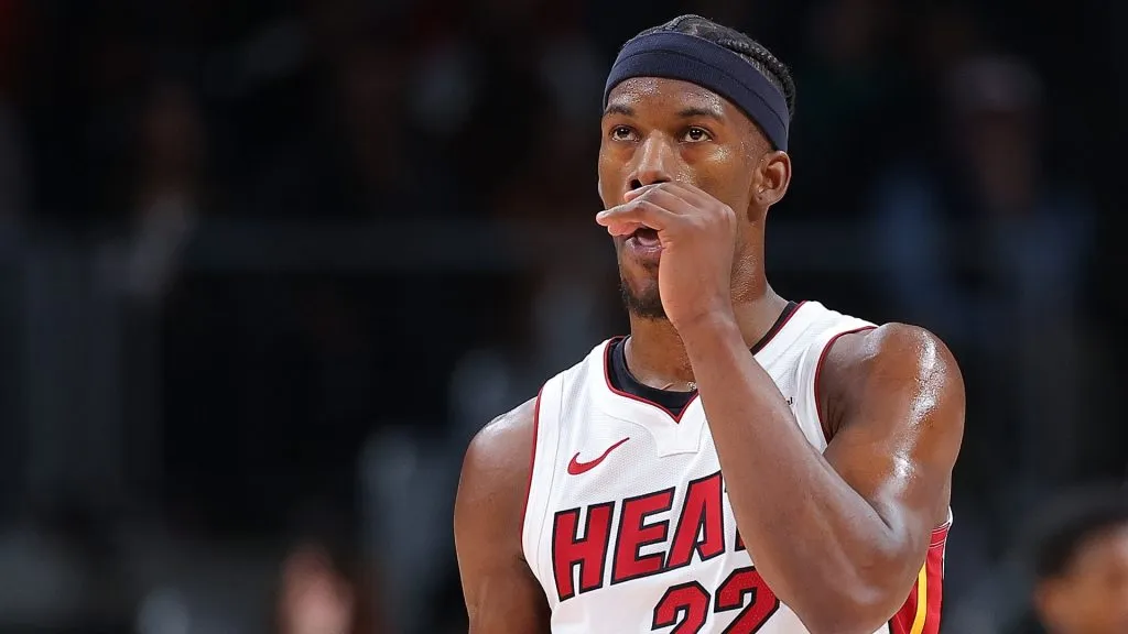Jimmy Butler #22 of the Miami Heat reacts after drawing a foul against Bogdan Bogdanovic #13 of the Atlanta Hawks during the fourth quarter at State Farm Arena on April 09, 2024 in Atlanta, Georgia.