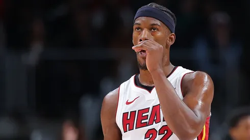 Jimmy Butler #22 of the Miami Heat reacts after drawing a foul against Bogdan Bogdanovic #13 of the Atlanta Hawks during the fourth quarter at State Farm Arena on April 09, 2024 in Atlanta, Georgia.