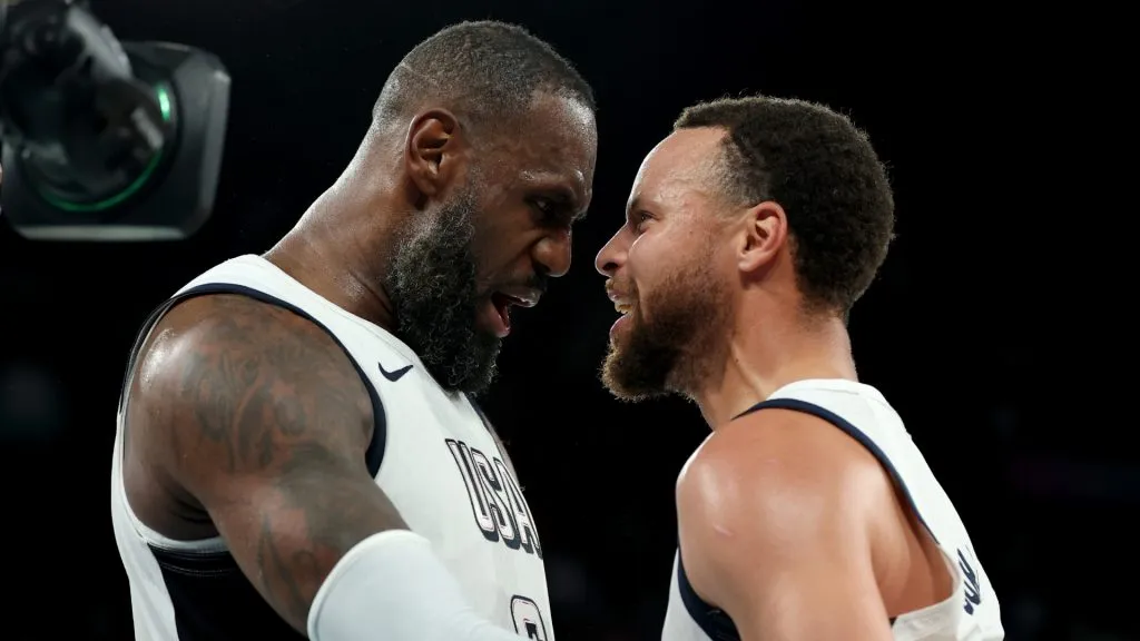 LeBron James #6 and Stephen Curry #4 of Team United States celebrate after their team’s win against Serbia. Gregory Shamus/Getty Images