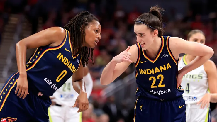 Indiana Fever stars Kelsey Mitchell and Caitlin Clark talk during WNBA game (