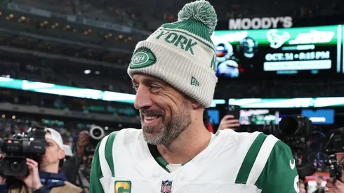 Aaron Rodgers #8 of the New York Jets interacts after the game at MetLife Stadium on October 14, 2024 in East Rutherford, New Jersey.