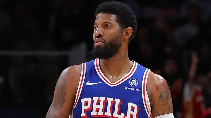 Paul George #8 of the Philadelphia 76ers brings the ball up the court against the Atlanta Hawks during the second quarter at State Farm Arena on October 14, 2024 in Atlanta, Georgia.