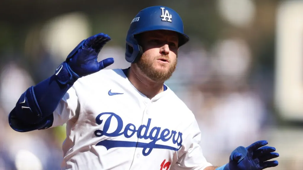 Max Muncy #13 of the Los Angeles Dodgers rounds the bases after a solo home run against the New York Mets in the fifth inning during Game Two of the Championship Series at Dodger Stadium on October 14, 2024 in Los Angeles, California. (Photo by Harry How/Getty Images)